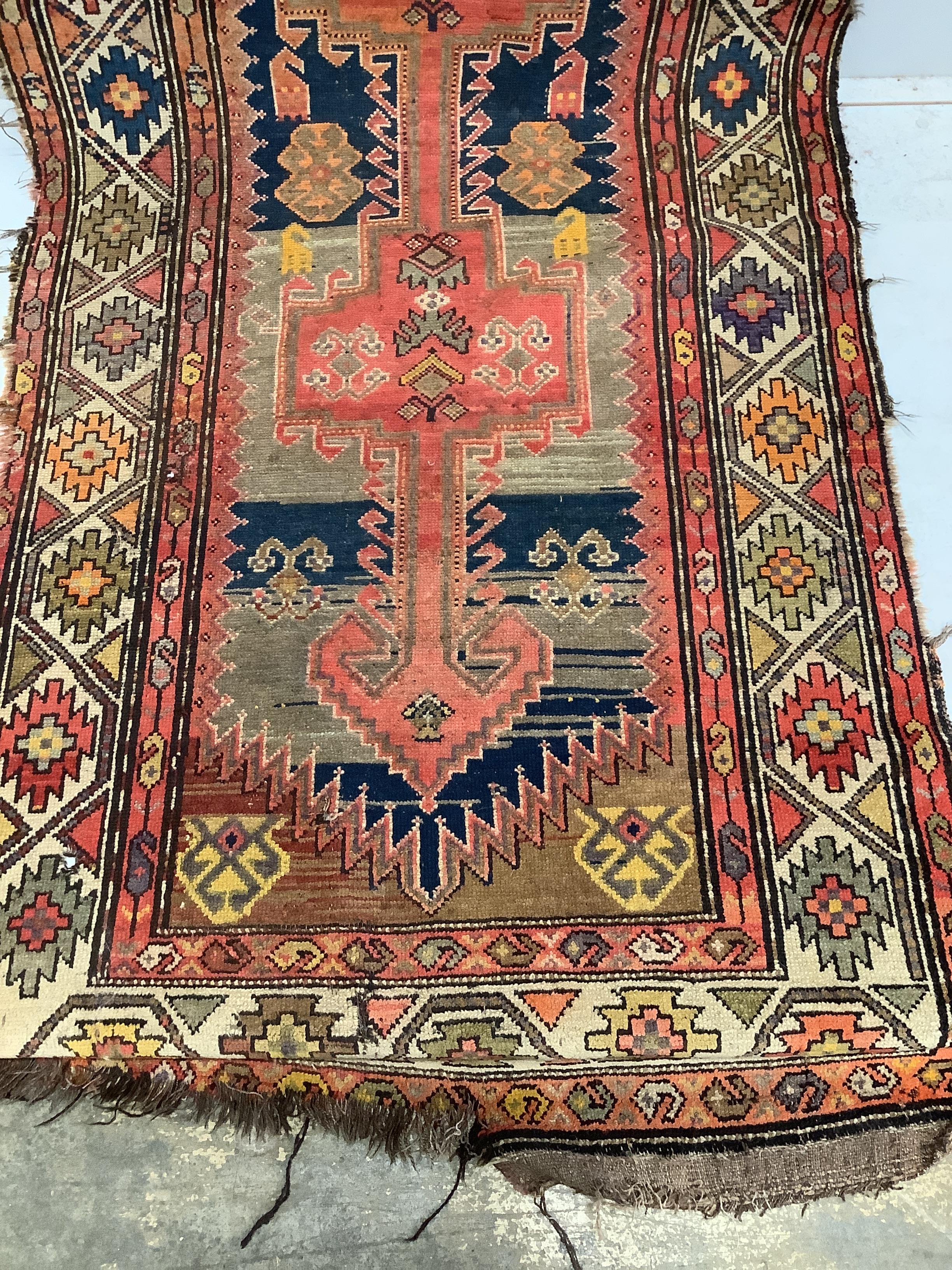 An antique Afghan runner, 350 x 104cm